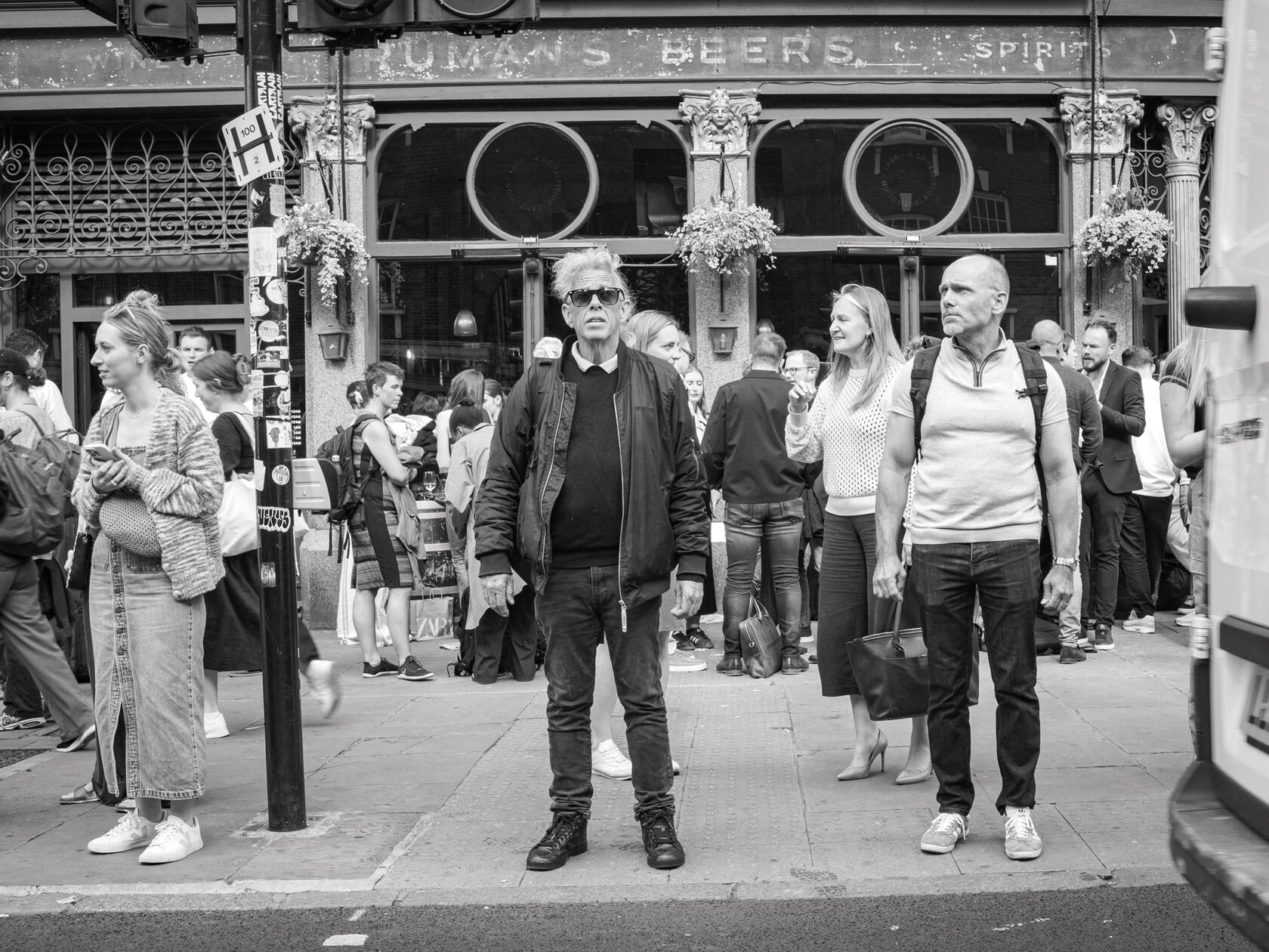 Waiting to cross the road